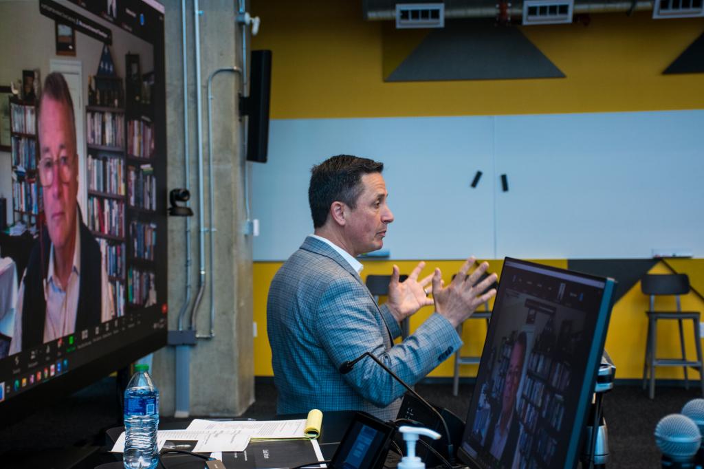 Professor speaking at an International Affairs symposium